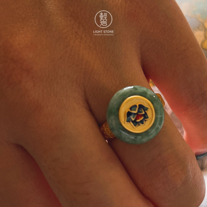 Unique jade lotus ring with burn-blue craftsmanship