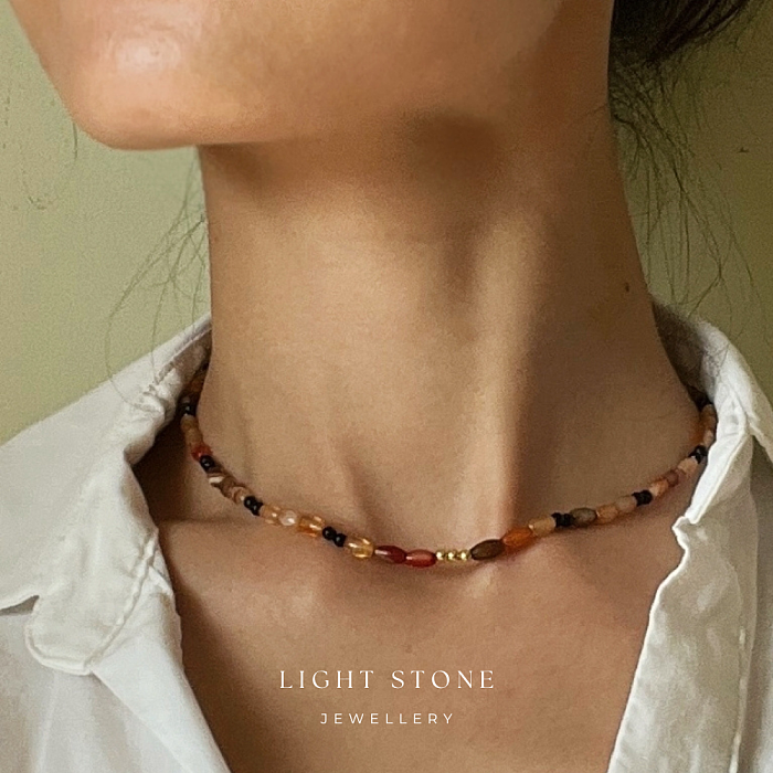 Fiery Silhouette designer handmade stone necklace featuring gradient and black agate beads