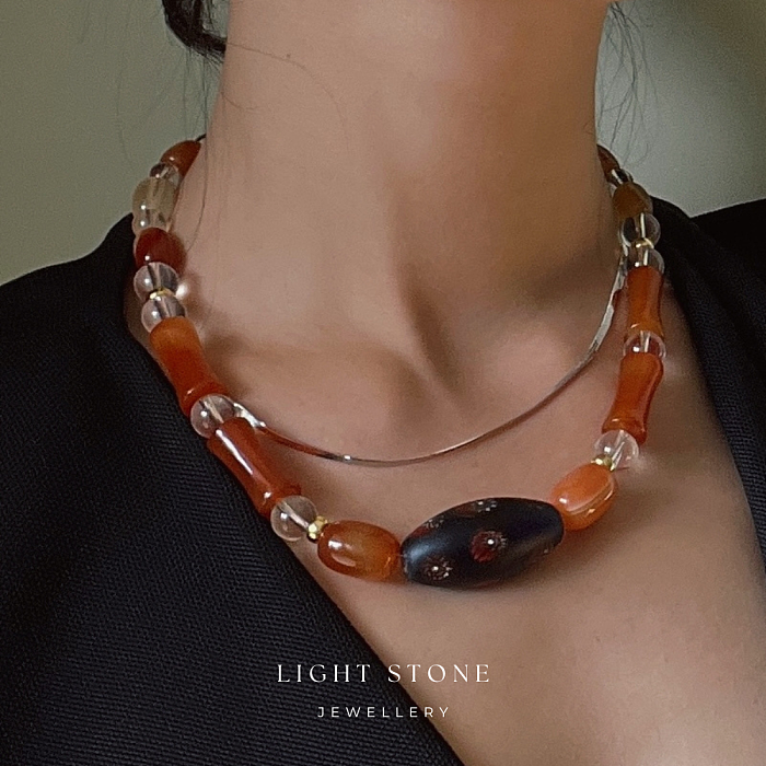Cherry Dream crystal and stone necklace featuring red agate and a handcrafted Zibo glass bead