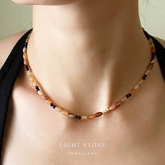 Fiery Silhouette designer handmade stone necklace featuring gradient and black agate beads