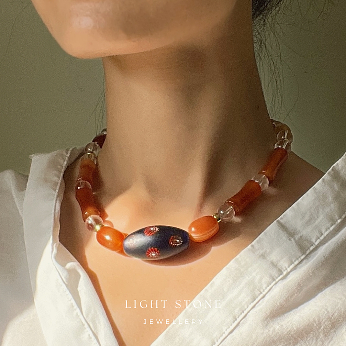 Cherry Dream crystal and stone necklace featuring red agate and a handcrafted Zibo glass bead