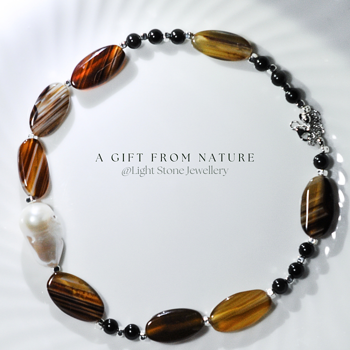 Mist-Cloaked Peaks designer necklace featuring a central Baroque pearl and striped agate stones