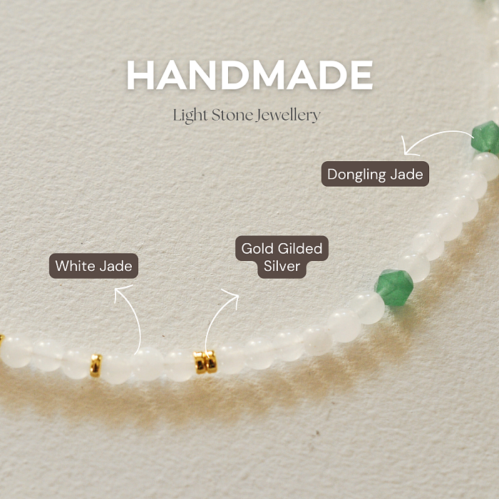 Jade Lotus designer handmade stone necklace featuring white jade and Dongling stone beads