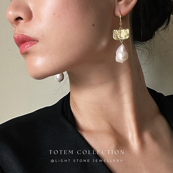 Elegant Phoenix Feather Baroque Pearl Earrings - Artistic Craftsmanship