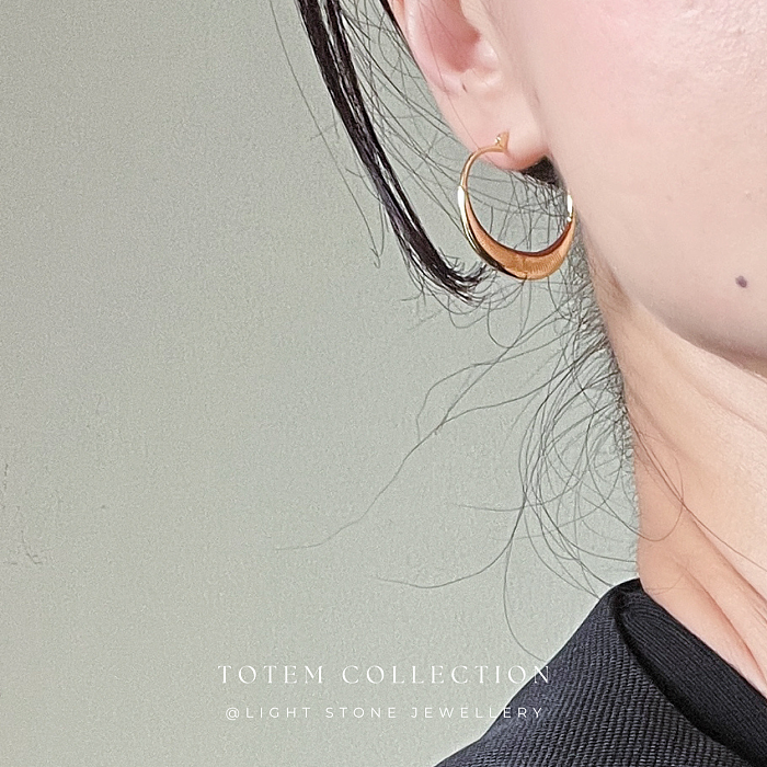 Eternal Elegance Gold Hoop Earrings - Traditional Totem Design
