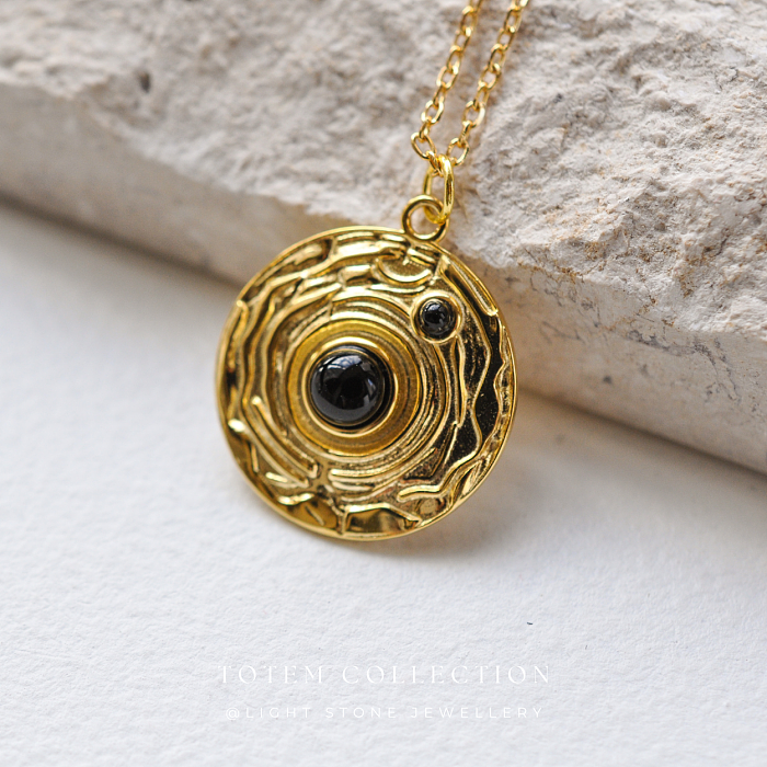 Gold-Plated Sterling Silver Pendant with Black Onyx Inspired by Neolithic Pot Patterns