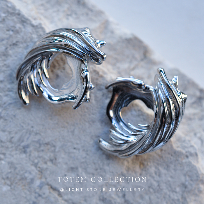 Elegant Rhodium Phoenix Feather Stud Earrings - Modern and Traditional Fusion