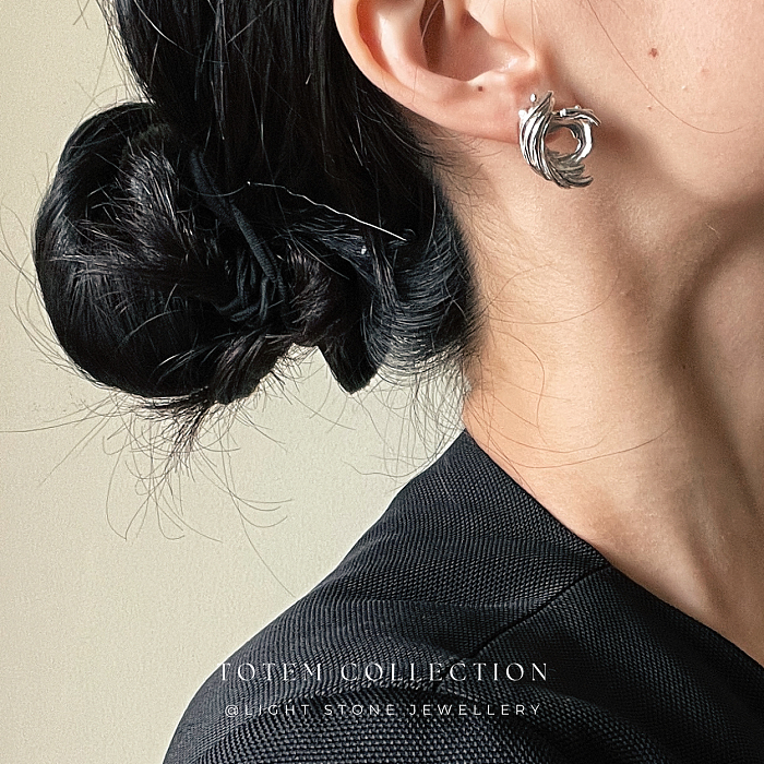 Elegant Rhodium Phoenix Feather Stud Earrings - Modern and Traditional Fusion