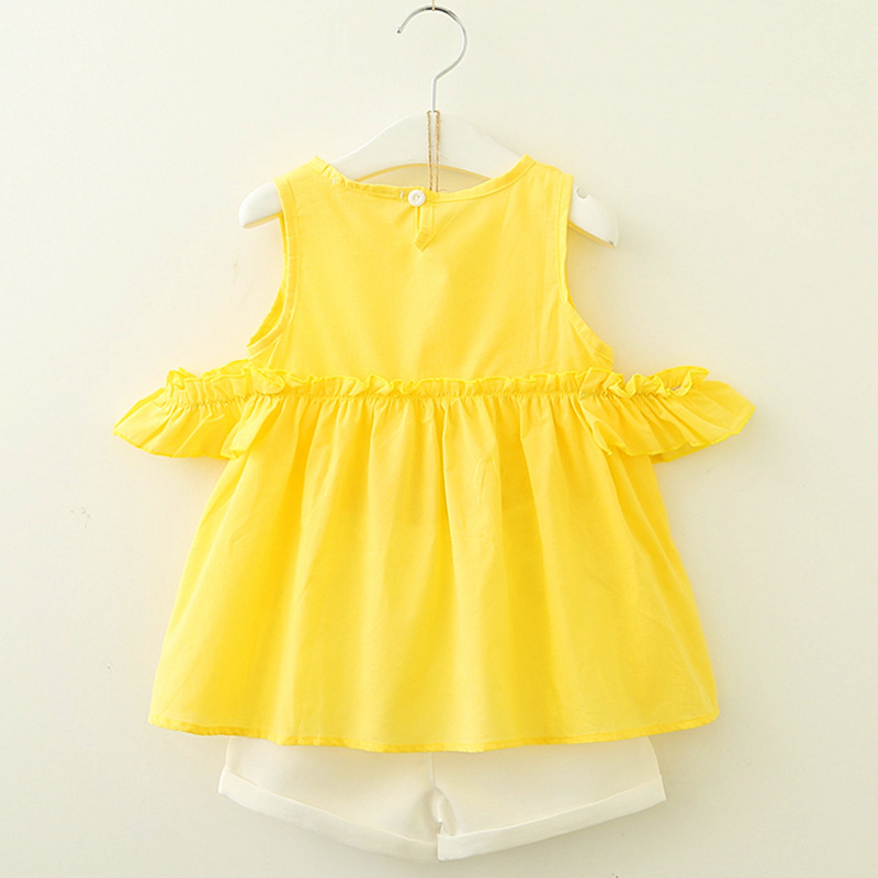 yellow two piece outfit