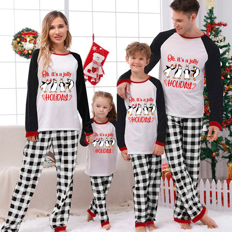 Christmas Matching Family Pajamas Funny Penguins It's a Jolly Holiday Red Pajamas Set
