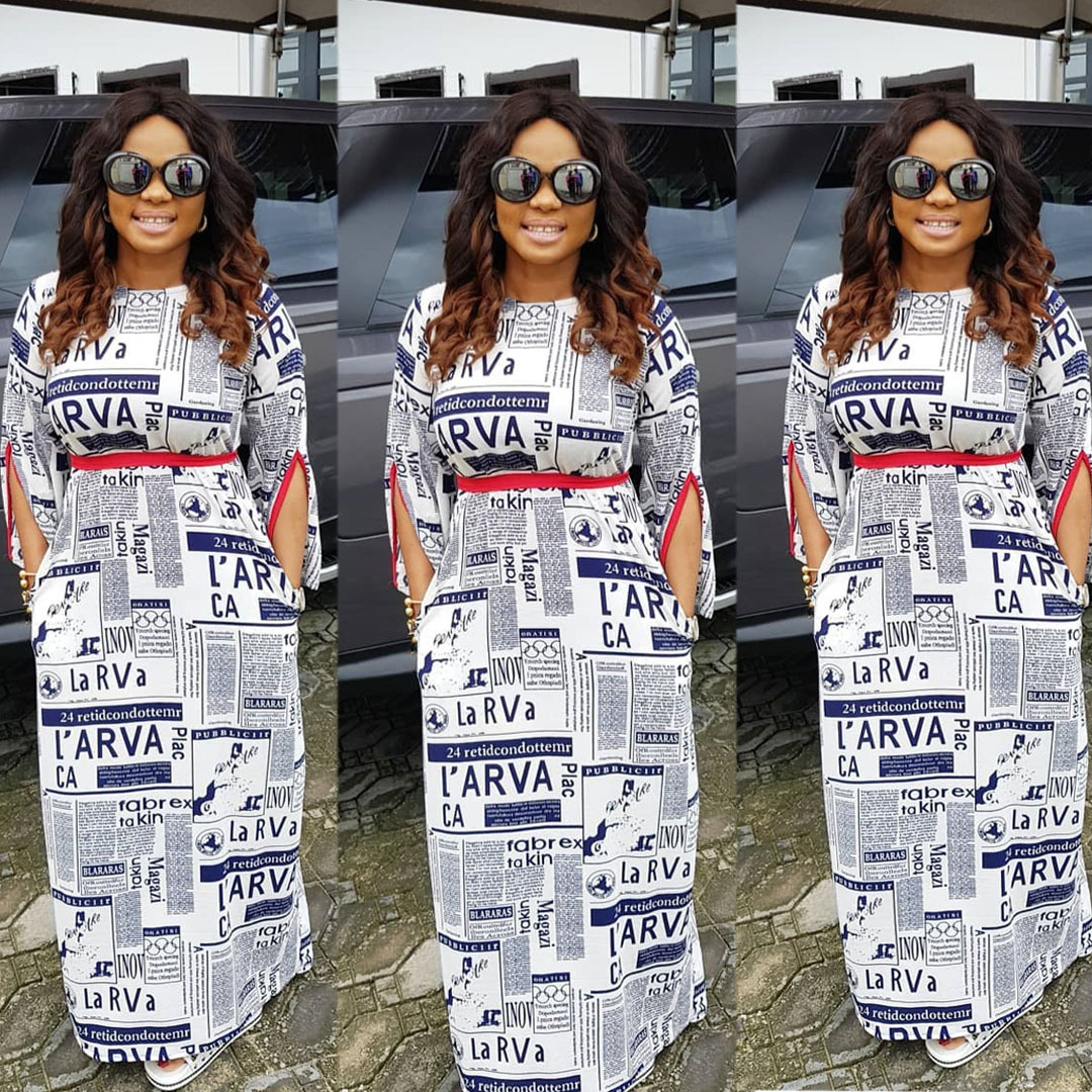 newspaper print maxi dress