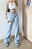 High-waisted lace-up jeans are ripped and loose, slimming straight leg jeans