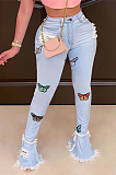 Casual fashion butterfly embroidered jeans with flounces and holes 