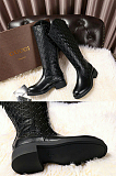 GG Leather Embossed Boots.