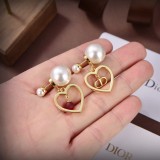 Dior Asymmetrical Pearl Stud Earrings