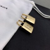 Balenciaga's New Gold Earrings