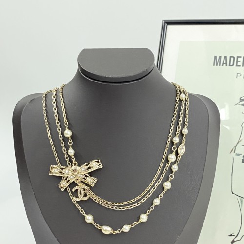 Chanel New Hollow Bow Three Chain Pearl Necklace