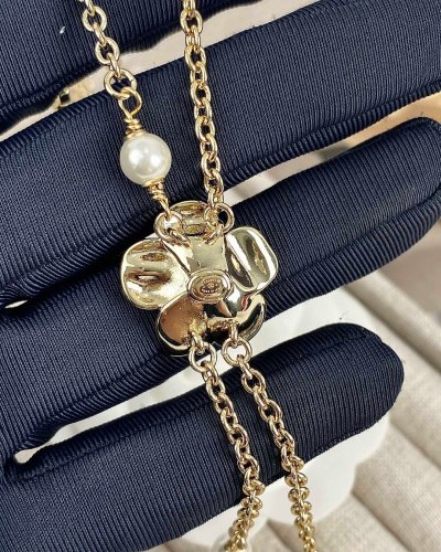 Chanel New Camellia Tassel Pearl Versatile Necklace Sweater Chain