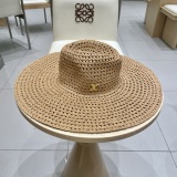 Louis Vuitton New Large Bbrimmed Hollow Grass Hat Sunscreen Beach Sunscreen Top Hat