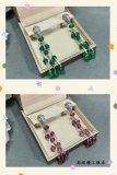 Bvlgari Fashion Personalized Diamond Studded Snakehead Tassel Earrings