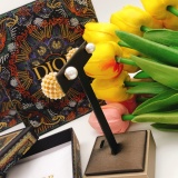 Dior Fashion Versatile Round Tennis Ball Size Pearl Hollow Earrings