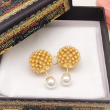Dior Fashion Versatile Round Tennis Ball Size Pearl Hollow Earrings