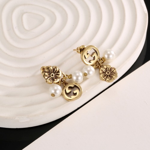 Gucci Classic Logo Pearl Asymmetric Retro Earrings