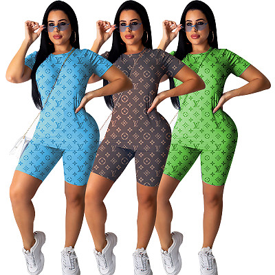 Q090202 wholesale fashion printed short-sleeved suit women clothing two piece pants set