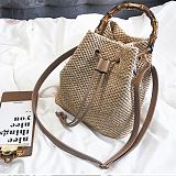 Hot sale 2020 hollow solid color bucket simple Best Cross Body Straw plaiting Lady bag handbag