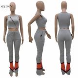 AOMEI Lowest Price Solid Color Streetwear Sportswear 2 Piece Set Women Sexy Bandage Hollow Out Two Piece Patchwork Pants Set