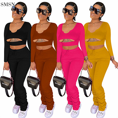 New Arrival Solid Color Casual Two Piece Set Women Clothing Hollow Out Top And Stacked Pants Women Outfits Two Piece Sets