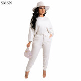 Hot Selling Solid color drop off shoulder bubble sleeves womens tracksuits 2 piece set winter