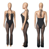 Wholesale halter mesh spliced women sexy club see through lady backless flare jumpsuit