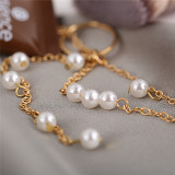 Network red clavicle chain Europe and America retro pearl pendant lady asymmetrical tassel necklace