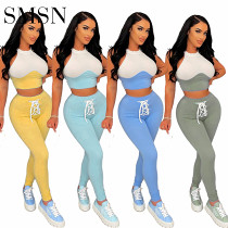 Sexy summer new sports suit women round neck tank top pencil two piece pants set