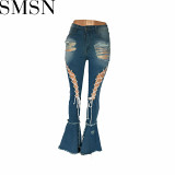 European and American mid waist retro tattered jeans elastic corns bandage mop denim bell bottom pants