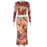 Printed Long Sleeved Open Umbilical Top Wrapped Hip Half Skirt Set