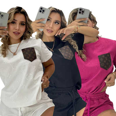 Fashion casual ladies embossed short sleeve shorts set
