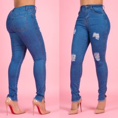 Tight pencil trousers for jeans with high waist and holes