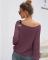Short knitted sweater with open-shouldered round tie