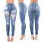 Fashion high waist jeans with holes