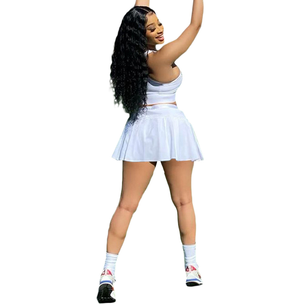 vest and tennis skirt