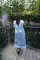 Pierced sleeveless denim coat cardigan Cloak