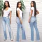 Large jeans with small holes