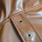 Fashionable sleeveless ruffled faux leather coat