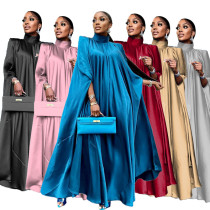 Long gown dress with high neck and big hem