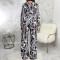 Sexy and fashionable printed long-sleeved V-neck jumpsuit