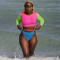 Fashionable contrasting color split swimwear