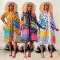 Fashionable printed long sleeved button up mid length dress