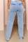 Fashionable loose fitting high waisted wide leg torn jeans